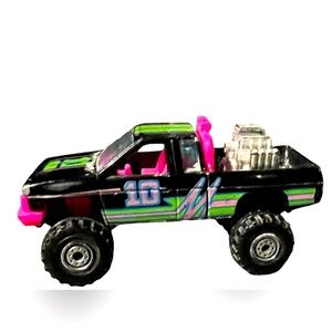 BLACK NISSAN HARDBODY PINK AND GREEN
